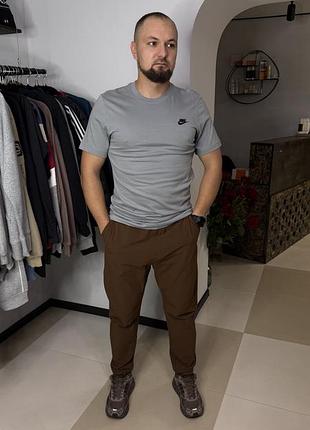Штани чоловікам nike sportswear men's woven commuter trousers, розмір m, артикул dm6621-259