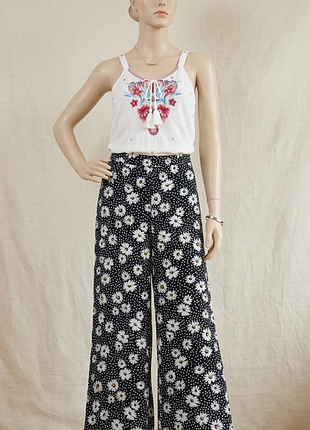 Легкі літні штани палаццо в ромашки від f&f