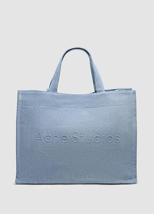 Трендова жіноча сумочка по типу acne studios logo-embossed distressed denim tote bag