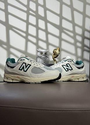 Женские кроссовки new balance 2002r pouch beige green