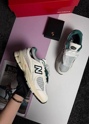 Женские кроссовки new balance 2002r pouch beige green
