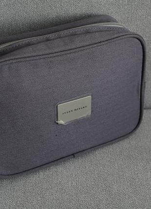 Чудова та якісна косметичка  issey miyake сірого кольору