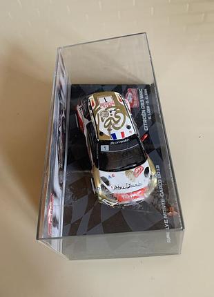 Коллекционная модель автомбиля citroën ds3 wrc, выигравшего ралли монте-карло в 2013 году.