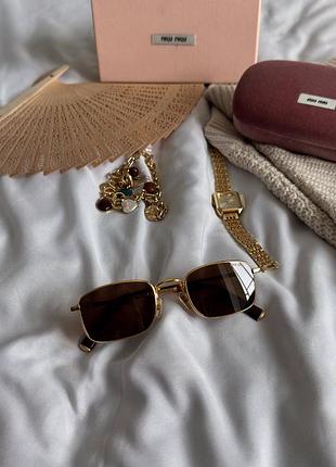 Окуляри miu miu brown/gold mua53s zvn050