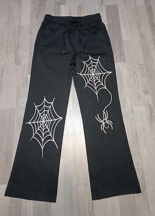 Женские брюки бренда sp5der от spider worldwide.