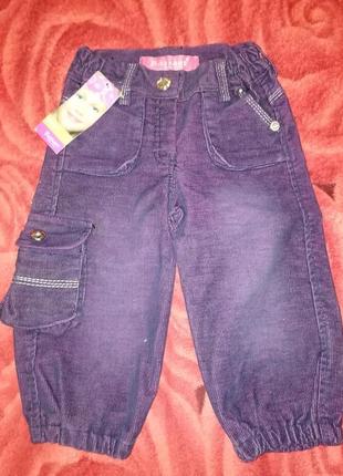 Фиолетовые штаны вельвет