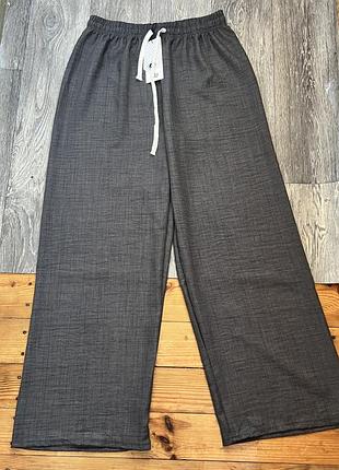 Нові жіночі брюки в сірому кольорі xl/xxl розмір