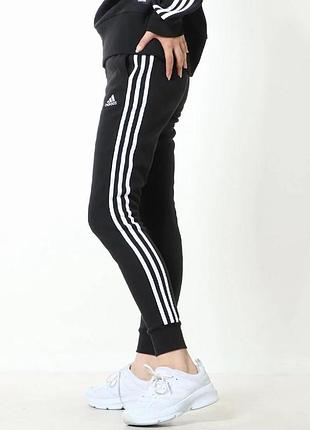 Жіночі спортивні штани на манжетах adidas