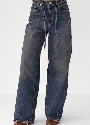 Жіночі джинси на зав'язках із потертостями