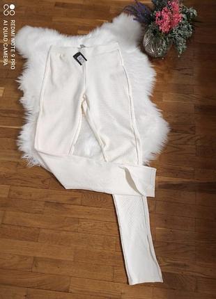 Штани в рубчик молочні