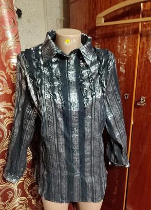 Шикарна срібна, стрейчова блузка.