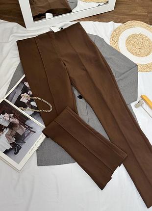 Нові коричневі брюки h&m 7