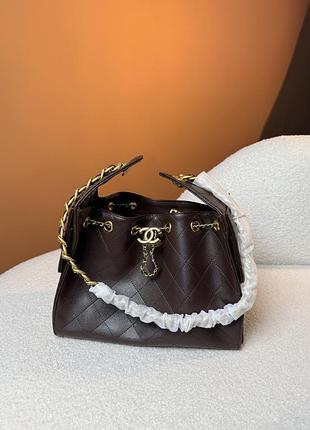 Chanel 25 small handbag in brown caviar leather with gold hardware
