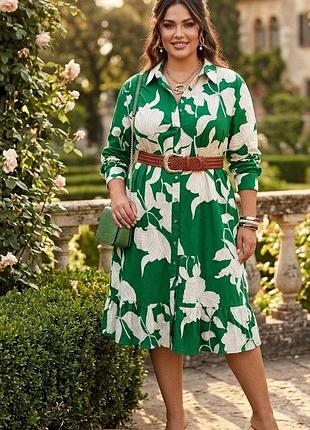 Сукня  міді бренду  h&m з   квітковим принтом на гудзиків з  гарного ракушняка.
заміри:пог-70 см.,довжина виробу по спині -91 см,довжина рукава-76 .