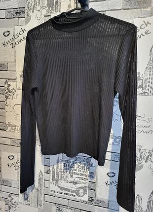 Прозора водолазка гольф в рубчик