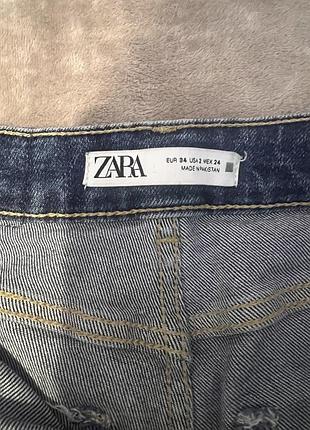 Жіночі джинси zara в 34 розмірі, кльош з розрізами по боках синього кольору