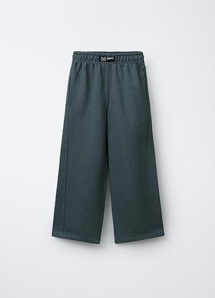 Брюки кюлоты для девочки трикотажные широкие zara 164 см темно-зеленые