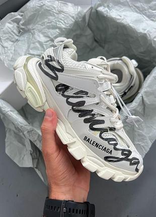 Track dirty white black logo