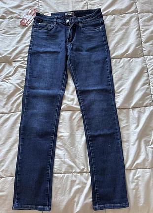 Жіночі джинси темно синього кольору