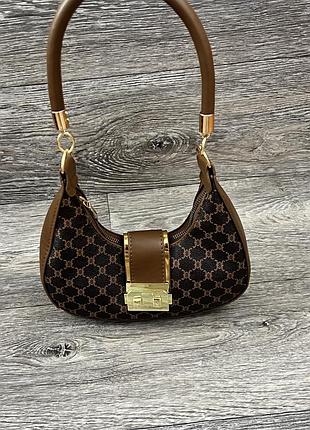 Маленька жіноча сумка через плече