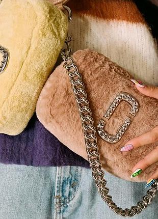 Натуральна шкіра та хутро.
американський бренд marc jacobs
