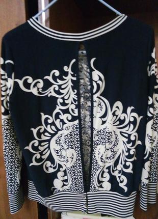 Блузка з вирізом на спині2 фото