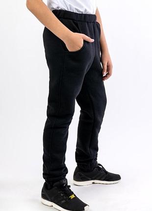 Тёплые штаны джоггеры на резинке с карманами3 фото