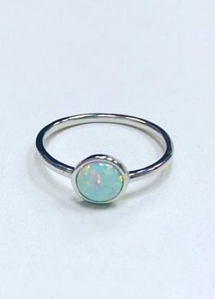 Серебряное кольцо с белым опалом родированное, размер 17,5, вес: 1.5 г