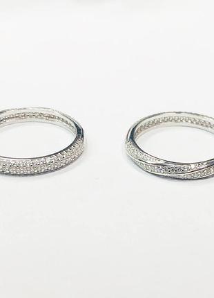 Серебряное кольцо двостороння со вставкой фианит