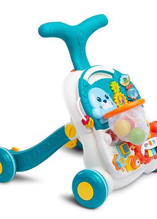 Ходунки-каталка игровой развивающий столик 2 в 1 caretero spark turquoise