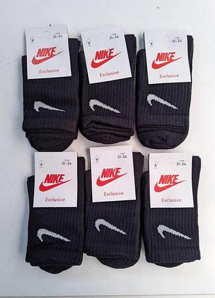 Детские высокие качественные хлопковые носки черные в наборе по 6 штук nike. размер 31-34