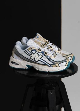 New balance 740 blue/gold