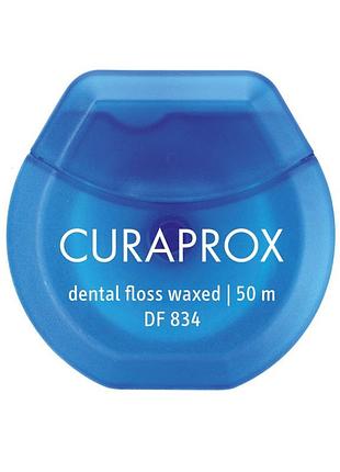 Нитка міжзубна вощена з ароматом м'яти curaprox df 834 50 м