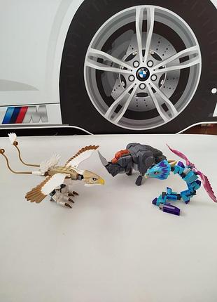 Часть набора bela fantastic beasts чемодан ньюта саламандера. эрумпент, окками и громовая птица.