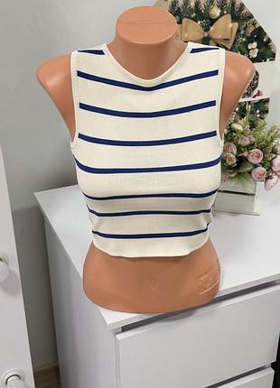 Трикотажний кроп-топ у синю смужку розмір хс primark