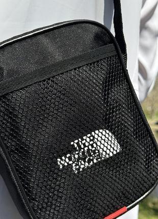 The north face барсетка спортивная черная просто носишь и идешь