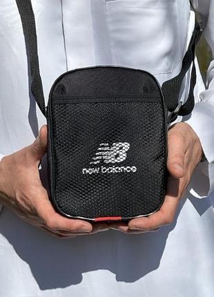Барсетка new balance черная - удобство в движении