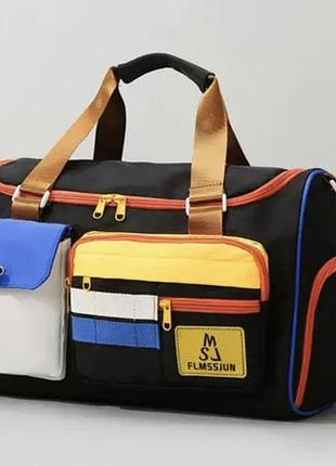 Сумка дорожня чорна color block з кольоровими кишенями 43х28х18 см. 1358