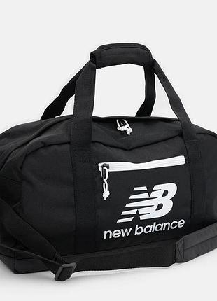New balance - міцна спортивна сумка з еко-шкірою