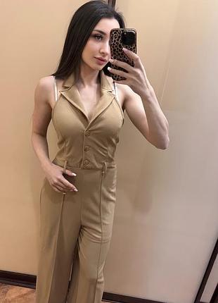 Комбінезон брючний бежевий