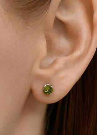 Серьги-гвоздики серебряные 925° с оливковым фианитом dilly