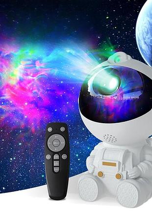 Нічник проектор астронавт космонавт astronaut лазерний дитячий світильник зоряного неба галактики зоряне небо з пультом (сидячий) 7443 білий