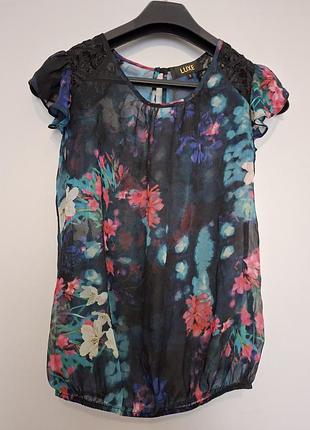 Блуза з квітковим принтом