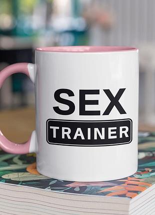 Чашка керамічна з принтом "sex trainer" 330 мл, біла з рожевою ручкою
