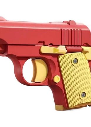 Детский игрушечный пистолет-антистресс red / yellow