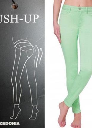 Жіночі джинси з ефектом push-up бренду calzedonia у яскравому м'ятному кольорі