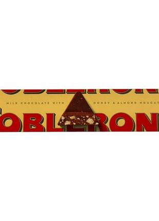 Шоколад молочный toblerone с миндалем и медом milk chocolate with honey i almond, 100 г