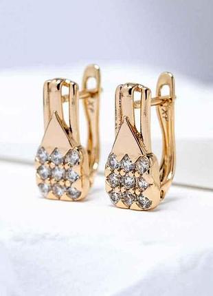 Серьги флориан 57353 16х7мм белые фианиты 2.8г позолота 18к тм xuping