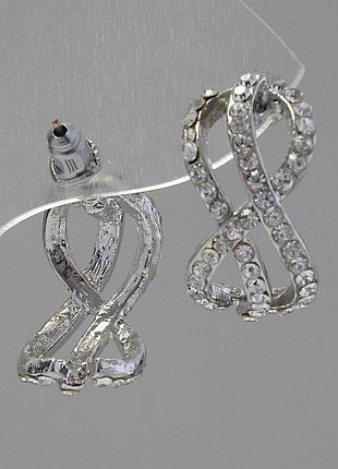 Серьги-пусеты бесконечность, белые стразы, металл под серебро, 2см