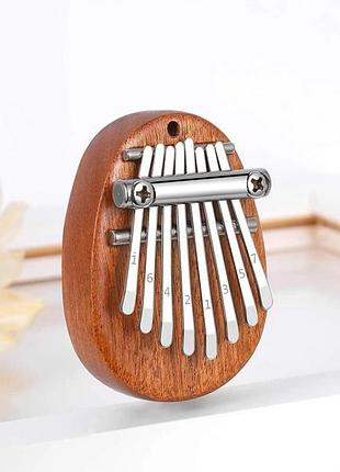 Калимба портативный музыкальный инструмент kalimba пальчиковое мини-пианино с 8 клавишами